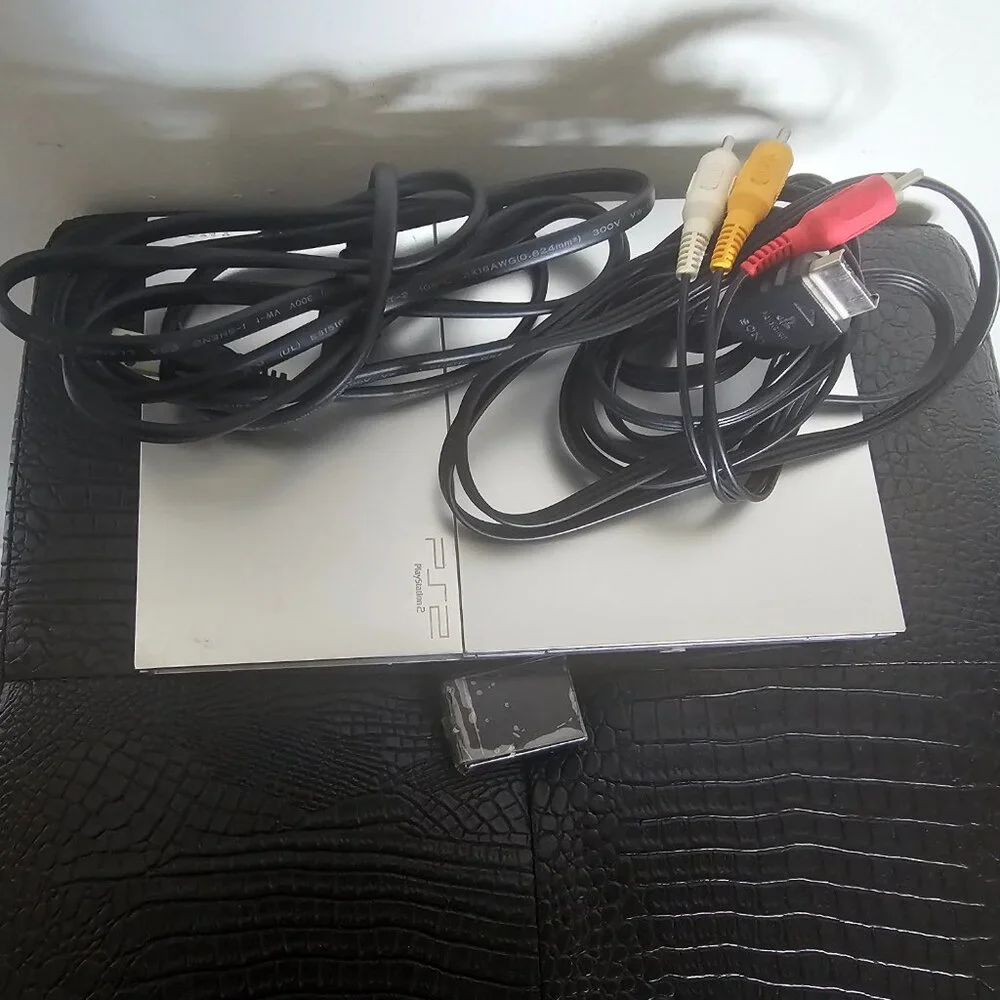 Playsation 2 (PS2 Fat) with controllers and games and PS2 Slim